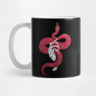 Red snake in skeleton hand Mug